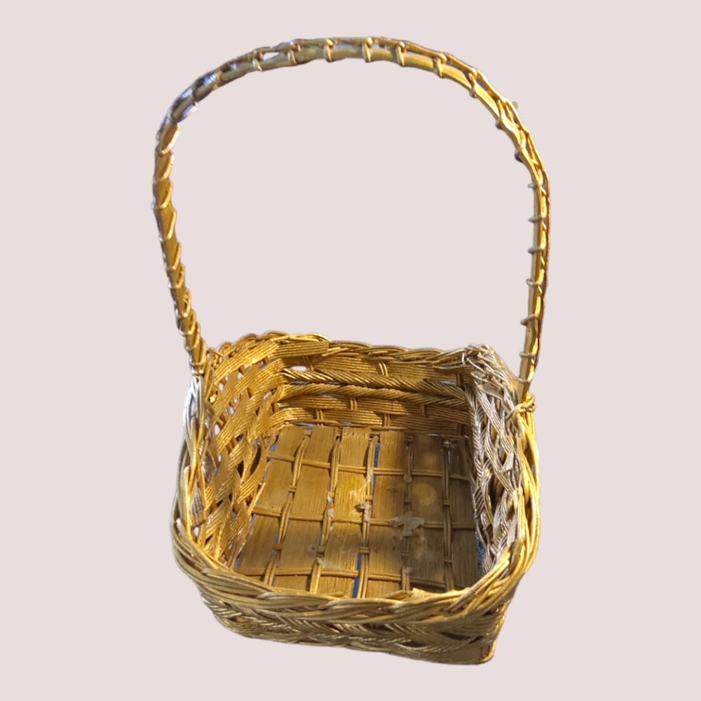 Hand woven fixed handle basket painted gold